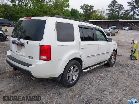 2011 Honda Pilot Touring z VIN 5FNYF4H9XBB053966, wystawiony jako IAAI lot #42148528 z przebiegiem 191 939 mil mil oraz . Historia ofert i sprzedaży dostępna na DreamBid. Obrazek 4.