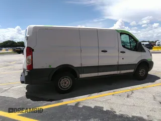 2015 Ford Transit Cargo with VIN 1FTYR1ZM3FKA82081, listed as a IAAI auction lot 42475225 with 255,716 mi miles and . Bid and sale history available at DreamBid. Image 13.