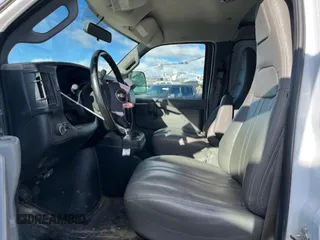 2021 Chevrolet Express Cargo with VIN 1GCWGBFP0M1206747, listed as a Copart auction lot 82701894 with Not provided miles and Salvage title. Bid and sale history available at DreamBid. Image 7.