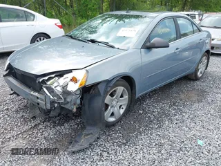 2009 Pontiac G6 1SA with VIN 1G2ZG57B794188694, listed as a IAAI auction lot 42473479 with 90,637 mi miles and . Bid and sale history available at DreamBid. Image 2.