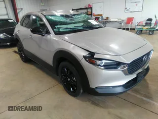 2024 Mazda CX-30 2.5 S Select Sport with VIN 3MVDMBBM0RM658069, listed as a IAAI auction lot 42130803 with 26,714 mi miles. Bid and sale history available at carsss.com. Image 1.
