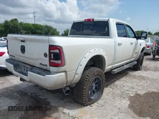 2023 Ram 2500 Laramie with VIN 3C6UR5FL3PG553812, listed as a IAAI auction lot 39891964 with 33,303 mi miles. Bid and sale history available at carsss.com. Image 4.
