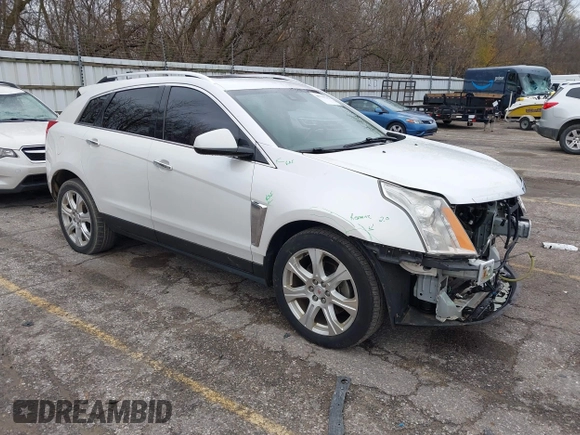 2014 Cadillac SRX Premium Collection z VIN 3GYFNDE34ES548826, wystawiony jako IAAI lot #40792942 z przebiegiem 115 984 mil mil oraz . Historia ofert i sprzedaży dostępna na DreamBid. Obrazek 1.