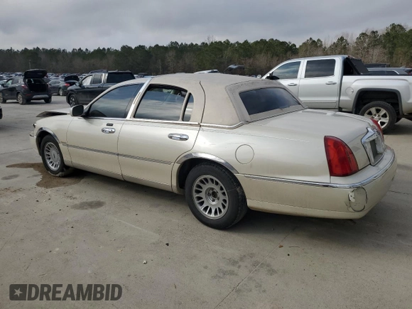 2002 Lincoln Town Car Cartier z VIN 1LNHM83W12Y622791, wystawiony jako Copart lot #43132885 z przebiegiem Nie podano mil oraz Szkody całkowita. Historia ofert i sprzedaży dostępna na DreamBid. Obrazek 2.