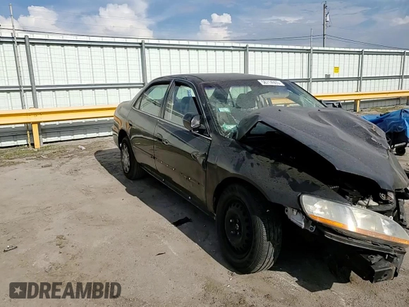 2000 Honda Accord LX z VIN 1HGCG5648YA015725, wystawiony jako Copart lot #56714905 z przebiegiem Nie podano mil oraz Szkoda całkowita • Salvage title. Historia ofert i sprzedaży dostępna na DreamBid. Obrazek 14.