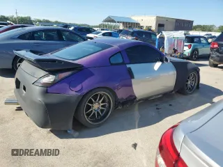 2005 Nissan 350Z with VIN JN1AZ34D05M608841, listed as a Copart auction lot 70408954 with 226,812 mi miles and Salvage Title. Bid and sale history available at DreamBid. Image 3.