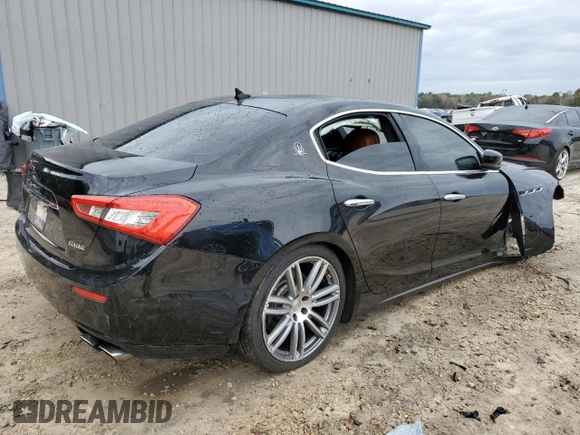2015 Maserati Ghibli S Q4 with VIN ZAM57RTA8F1144369, listed as a Copart auction lot 77810033 with 82,749 mi miles. Bid and sale history available at carsss.com. Image 3.