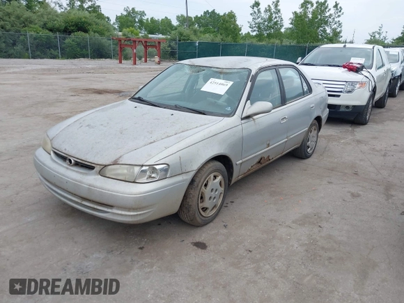 1999 Toyota Corolla VE z VIN 2T1BR12E7XC154444, wystawiony jako IAAI lot #42514069 z przebiegiem 209 377 mil mil oraz . Historia ofert i sprzedaży dostępna na DreamBid. Obrazek 2.
