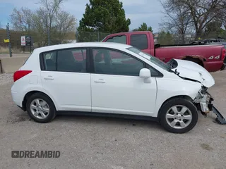 2009 Nissan Versa S with VIN 3N1BC13E39L450242, listed as a IAAI auction lot 42145528 with 239,291 mi miles and . Bid and sale history available at DreamBid. Image 14.