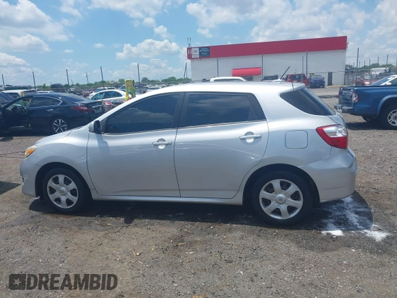 2009 Toyota Matrix z VIN 2T1KU40E89C100754, wystawiony jako IAAI lot #42255027 z przebiegiem 123 769 mil mil oraz . Historia ofert i sprzedaży dostępna na DreamBid. Obrazek 14.