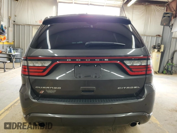 2018 Dodge Durango Citadel Anodized Platinum with VIN 1C4SDJET5JC369250, listed as a Copart auction lot 71709494 with 100,992 mi miles and Salvage title. Bid and sale history available at DreamBid. Image 6.