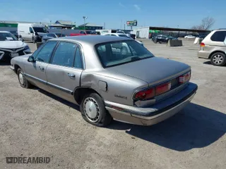 1995 Buick LeSabre Custom with VIN 1G4HP52L5SH487893, listed as a IAAI auction lot 41680378 with 121,742 mi miles. Bid and sale history available at carsss.com. Image 3.