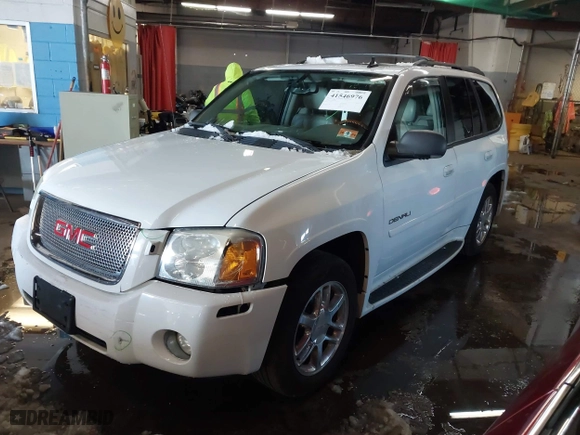 2006 GMC Envoy Denali with VIN 1GKET63M462161774, listed as a IAAI auction lot 41546976 with 144,729 mi miles. Bid and sale history available at carsss.com. Image 16.