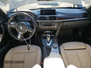 2015 BMW 3 Series 328i xDrive with VIN WBA3B3C59FJ985091, listed as a Copart auction lot 57658705 with 106,521 mi miles and Salvage title. Bid and sale history available at DreamBid. Image 8.