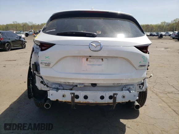2018 Mazda CX-5 Touring with VIN JM3KFBCMXJ0389773, listed as a Copart auction lot 54737795 with 82,103 mi miles and Salvage Title. Bid and sale history available at DreamBid. Image 6.