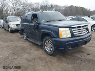 2004 Cadillac Escalade with VIN 1GYEK63N74R185587, listed as a IAAI auction lot 41352020 with 999,999 mi miles. Bid and sale history available at carsss.com. Image 1.