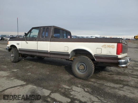 1991 Ford F-250 z VIN 1FTHX26G1MKB21130, wystawiony jako Copart lot #42222245 z przebiegiem 13 849 mil mil oraz Szkoda całkowita • Salvage title. Historia ofert i sprzedaży dostępna na DreamBid. Obrazek 2.