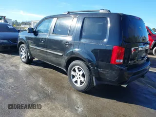 2010 Honda Pilot Touring with VIN 5FNYF4H95AB030531, listed as a IAAI auction lot 41441088 with 274,185 mi miles and . Bid and sale history available at carsss.com. Image 3.