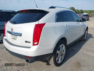 2011 Cadillac SRX Performance Collection with VIN 3GYFNBEYXBS540807, listed as a IAAI auction lot 42034047 with 198,429 mi miles. Bid and sale history available at carsss.com. Image 4.