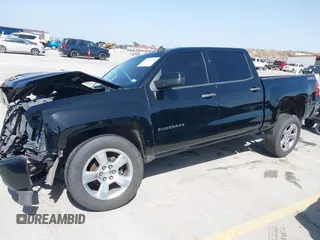 2014 Chevrolet Silverado 1500 LT with VIN 3GCUKREH8EG210945, listed as a IAAI auction lot 41718435 with 106,320 mi miles and . Bid and sale history available at DreamBid. Image 17.