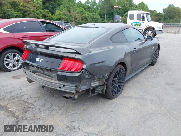 2019 Ford Mustang GT with VIN 1FA6P8CF0K5124320, listed as a IAAI auction lot 42314129 with 102,589 mi miles and . Bid and sale history available at DreamBid. Image 4.
