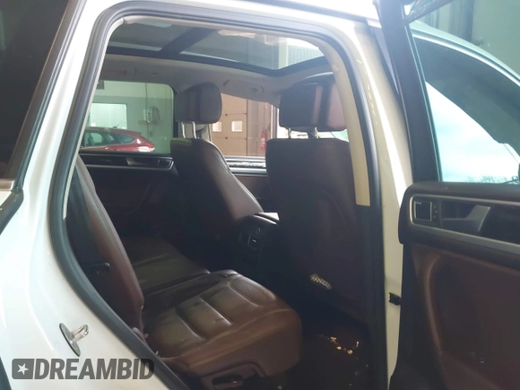 2013 Volkswagen Touareg Lux with VIN WVGEF9BP6DD007323, listed as a IAAI auction lot 41488959 with 123,383 mi miles and . Bid and sale history available at DreamBid. Image 8.