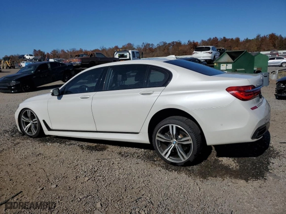2016 BMW 7 Series 750i xDrive with VIN WBA7F2C57GG419753, listed as a Copart auction lot 77201564 with 106477 miles and Salvage Title. Bid and sale history available at carsss.com. Image 2.