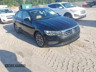 2019 Volkswagen Jetta S z VIN 3VWC57BUXKM091718, wystawiony jako IAAI lot #42837718 z przebiegiem 45 542 mil mil oraz . Historia ofert i sprzedaży dostępna na DreamBid. Obrazek 1.