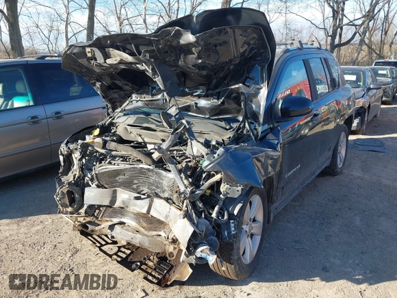 2014 Jeep Compass Latitude with VIN 1C4NJDEB7ED623202, listed as a IAAI auction lot 41696864 with 89,129 mi miles. Bid and sale history available at carsss.com. Image 2.