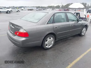 2003 Toyota Avalon XL with VIN 4T1BF28B93U337672, listed as a IAAI auction lot 41626441 with 240,787 mi miles and . Bid and sale history available at carsss.com. Image 4.