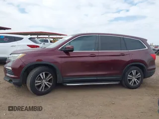 2016 Honda Pilot EX-L with VIN 5FNYF5H57GB028307, listed as a IAAI auction lot 41925711 with 125,118 mi miles and . Bid and sale history available at DreamBid. Image 14.