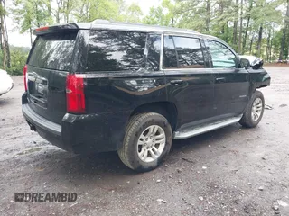 2015 Chevrolet Tahoe LT with VIN 1GNSCBKC9FR600997, listed as a IAAI auction lot 42383789 with 161,151 mi miles and . Bid and sale history available at DreamBid. Image 4.