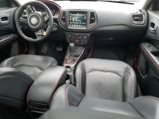 2017 Jeep Compass Trailhawk with VIN 3C4NJDDB2HT646693, listed as a Copart auction lot 58200235 with 62,765 mi miles and Salvage title. Bid and sale history available at DreamBid. Image 8.