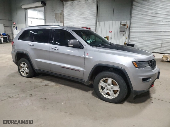 2019 Jeep Grand Cherokee Trailhawk with VIN 1C4RJFLT6KC849550, listed as a Copart auction lot 84006364 with 54,518 mi miles and Salvage Title. Bid and sale history available at carsss.com. Image 4.