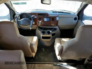 2016 Ford Econoline Commercial with VIN 1FDXE4FS7GDC01103, listed as a Copart auction lot 69039204 with 9,986 mi miles and Salvage Title. Bid and sale history available at carsss.com. Image 8.