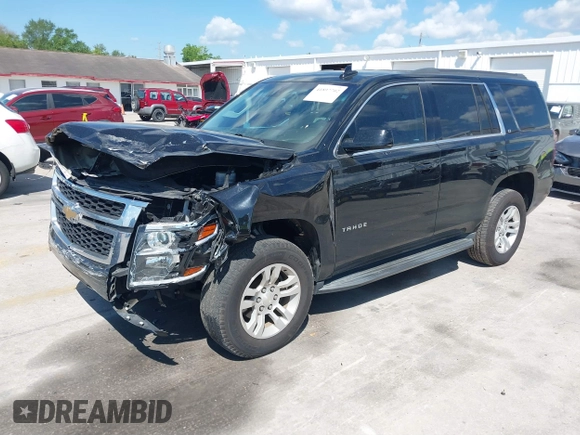 2019 Chevrolet Tahoe LT z VIN 1GNSKBKC1KR200476, wystawiony jako IAAI lot #41897702 z przebiegiem 136 432 mil mil oraz . Historia ofert i sprzedaży dostępna na DreamBid. Obrazek 17.