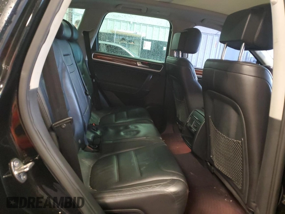 2011 Volkswagen Touareg Exec with VIN WVGFK9BP8BD003948, listed as a Copart auction lot 48285065 with 152,497 mi miles and Salvage Title. Bid and sale history available at DreamBid. Image 10.