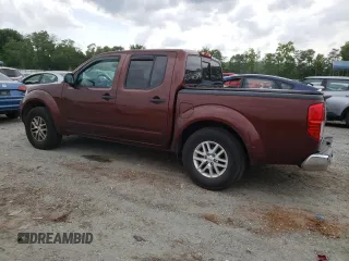 2017 Nissan Frontier SV with VIN 1N6DD0ER5HN700802, listed as a Copart auction lot 57764685 with 121,473 mi miles and Salvage title. Bid and sale history available at DreamBid. Image 2.