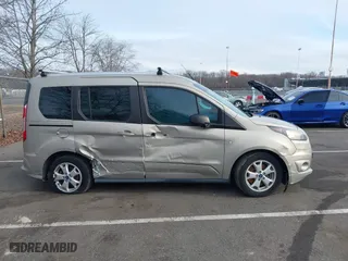 2015 Ford Transit Connect Wagon XLT with VIN NM0AE8F74F1179538, listed as a IAAI auction lot 41505221 with 57,798 mi miles. Bid and sale history available at carsss.com. Image 13.