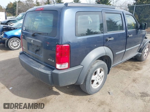 2008 Dodge Nitro SXT with VIN 1D8GU28K28W189765, listed as a IAAI auction lot 41834961 with 214,837 mi miles. Bid and sale history available at carsss.com. Image 4.