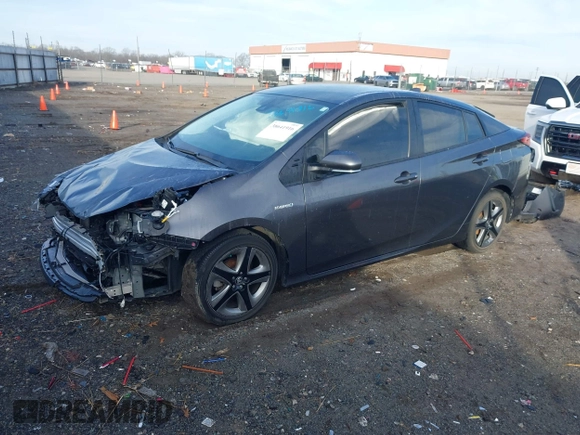 2021 Toyota Prius L Eco z VIN JTDKAMFU1M3149965, wystawiony jako IAAI lot #38641916 z przebiegiem 69 942 mil mil oraz . Historia ofert i sprzedaży dostępna na DreamBid. Obrazek 18.