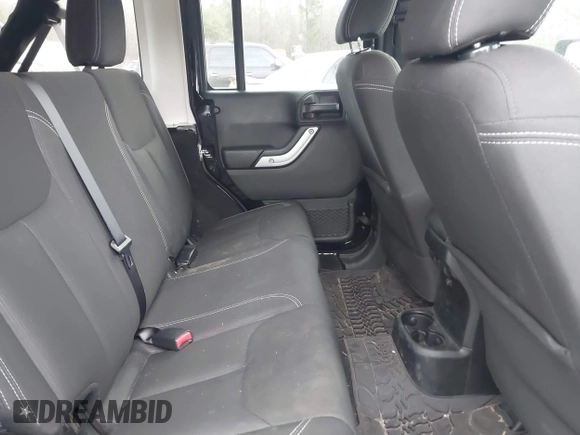 2017 Jeep Wrangler Unlimited Rubicon with VIN 1C4BJWFG4HL679150, listed as a IAAI auction lot 41720239 with 81,142 mi miles and . Bid and sale history available at DreamBid. Image 8.