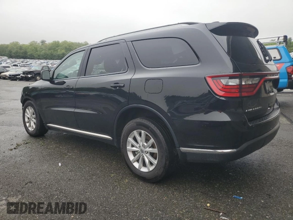 2023 Dodge Durango SXT with VIN 1C4RDHAG5PC634936, listed as a Copart auction lot 57282195 with 56,689 mi miles and Salvage title. Bid and sale history available at DreamBid. Image 2.