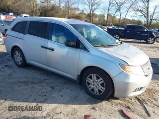 2011 Honda Odyssey LX z VIN 5FNRL5H2XBB023100, wystawiony jako IAAI lot #41605637 z przebiegiem 241 955 mil mil oraz . Historia ofert i sprzedaży dostępna na DreamBid. Obrazek 1.