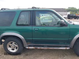 1999 Ford Explorer Sport z VIN 1FMYU24X0XUC46121, wystawiony jako IAAI lot #42351681 z przebiegiem 204 345 mil mil oraz . Historia ofert i sprzedaży dostępna na DreamBid. Obrazek 13.