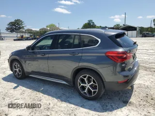 2017 BMW X1 sDrive28i with VIN WBXHU7C32HP925374, listed as a Copart auction lot 54820225 with 136,708 mi miles and Clean Title. Bid and sale history available at carsss.com. Image 2.