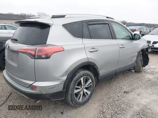 2018 Toyota RAV4 XLE with VIN 2T3RFREV1JW842728, listed as a IAAI auction lot 41519668 with 149,670 mi miles. Bid and sale history available at carsss.com. Image 4.