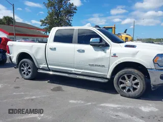 2020 Ram 2500 Longhorn with VIN 3C6UR5GL6LG230556, listed as a IAAI auction lot 38787704 with Not provided miles and . Bid and sale history available at DreamBid. Image 6.