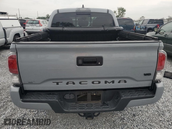 2020 Toyota Tacoma SR5 with VIN 3TMAZ5CNXLM121344, listed as a Copart auction lot 59393395 with 69,902 mi miles and Salvage title. Bid and sale history available at DreamBid. Image 6.