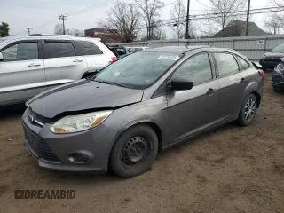 2013 Ford Focus S with VIN 1FADP3E22DL330158, listed as a Copart auction lot 52729135 with 113,624 mi miles and Salvage Title. Bid and sale history available at carsss.com. Image 1.